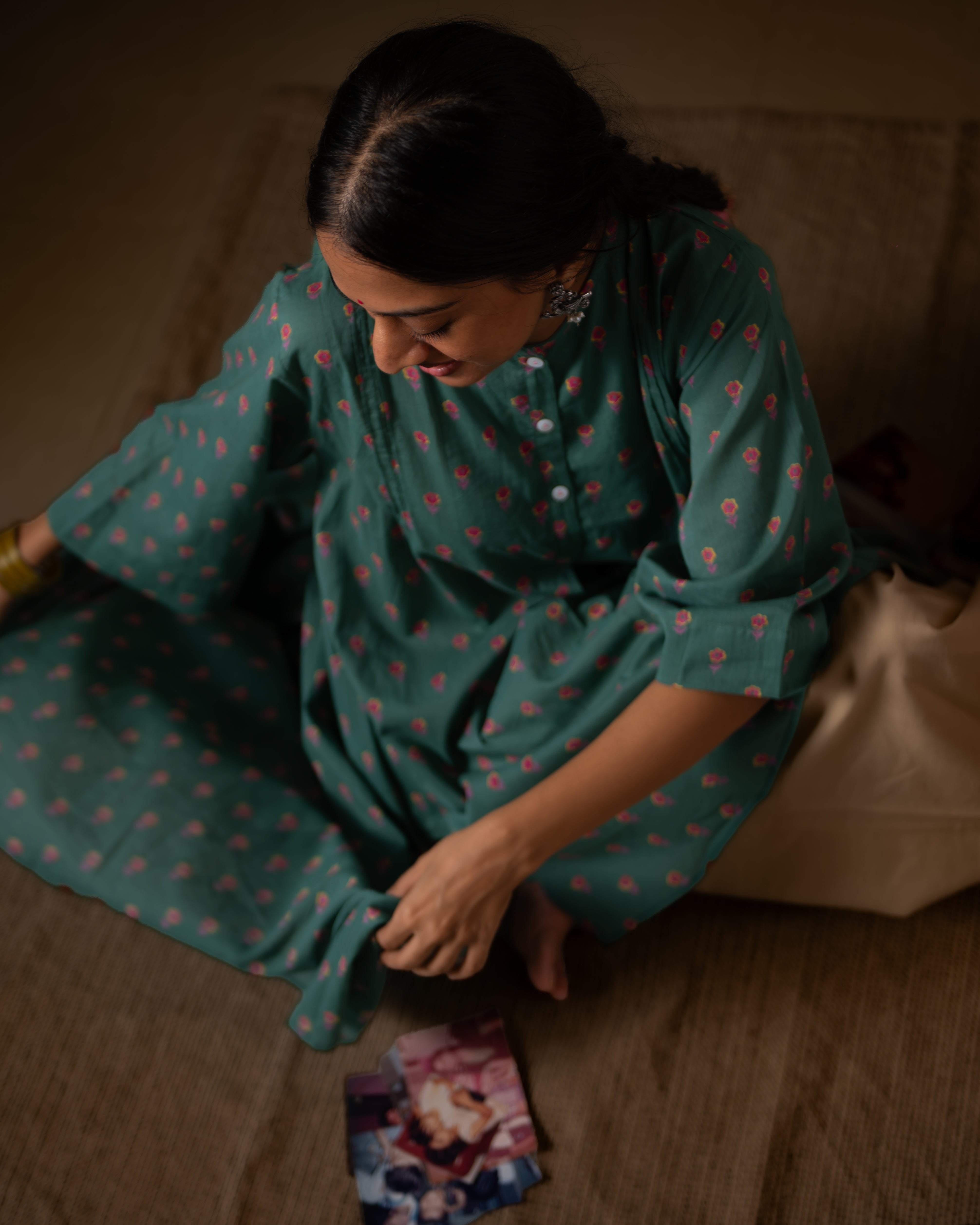 Dark green high low tunic kurta with pink Floral hand block print. Made in 100% cotton.