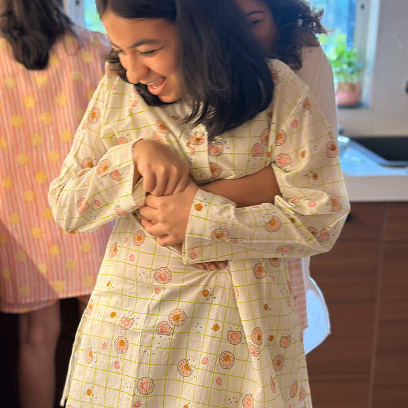 Unisex cotton kurta and shorts co ord set. Checkered kurta and Shorts hand block printed by artisans in Jaipur, Rajasthan. Kurta has shell buttons and small pockets.