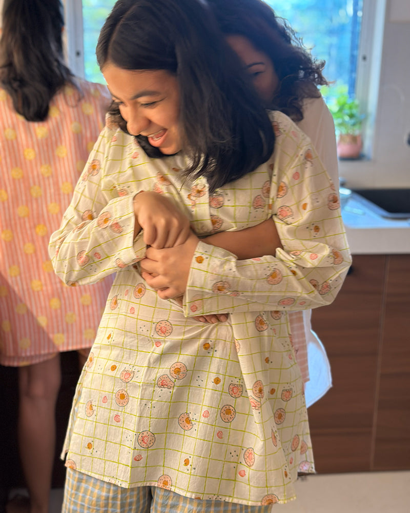 Unisex cotton kurta and shorts co ord set. Checkered kurta and Shorts hand block printed by artisans in Jaipur, Rajasthan. Kurta has shell buttons and small pockets.
