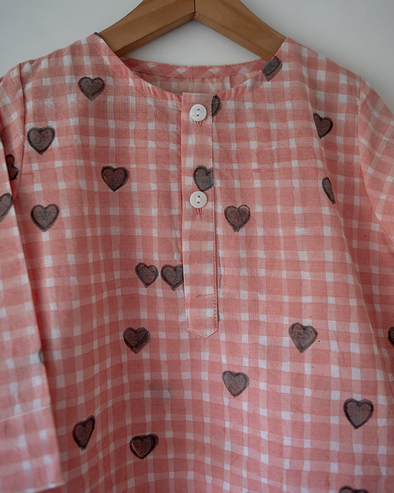 Unisex GOTS certified organic cotton pajama paired with checkered hand block printed kurta with pockets and natural shell buttons. Grandpa style kurta pajama set.