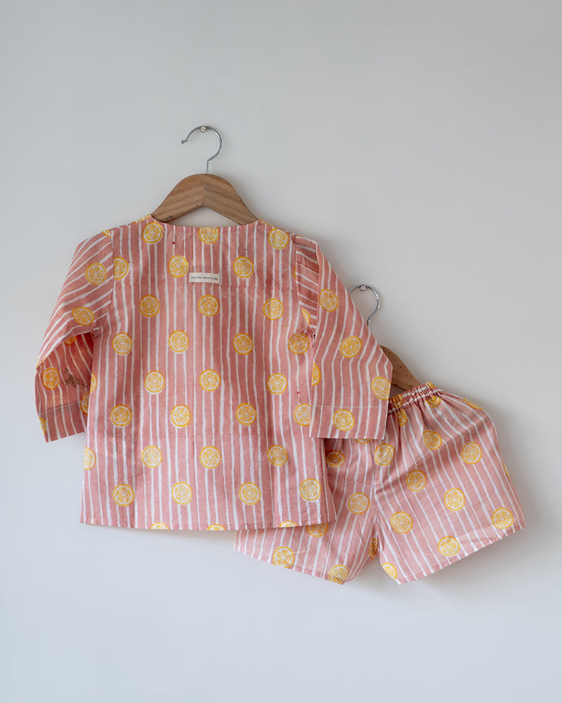 Unisex cotton kurta and grey shorts co ord set. Striped kurta and Shorts hand block printed by artisans in Jaipur, Rajasthan. Small pockets in both kurta and shorts.
