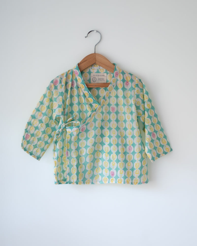 Light green hand block print Angrakha kurta for infants. Has side tie ups.