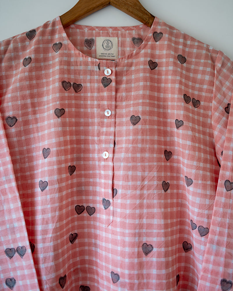 Unisex adults GOTS certified organic cotton pajama paired with peach checkered hand block printed kurta with pockets and natural shell buttons.