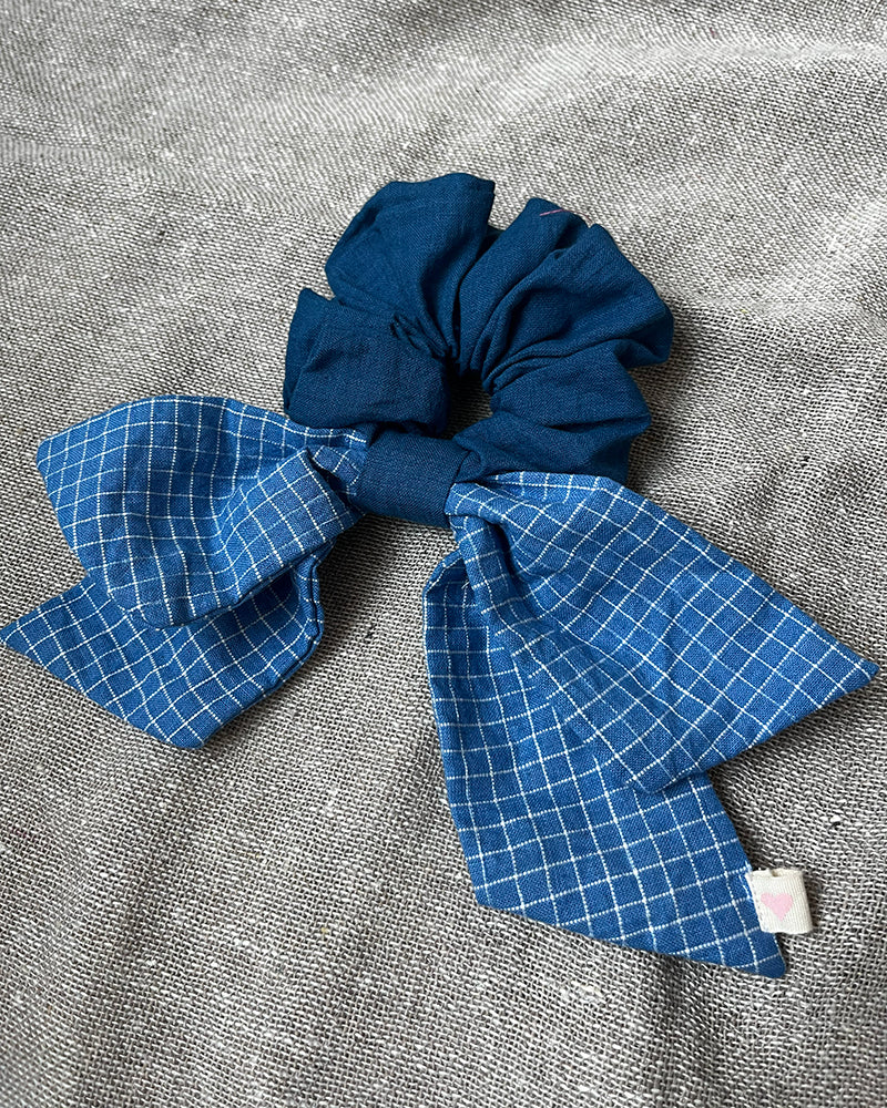 Solid blue scrunchie with blue checkered bow