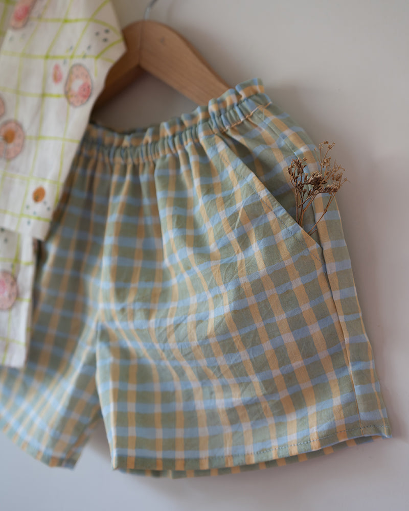 Checkered cotton shorts hand block printed. Shorts have a soft elasticated waist for ease of wear and small pockets.