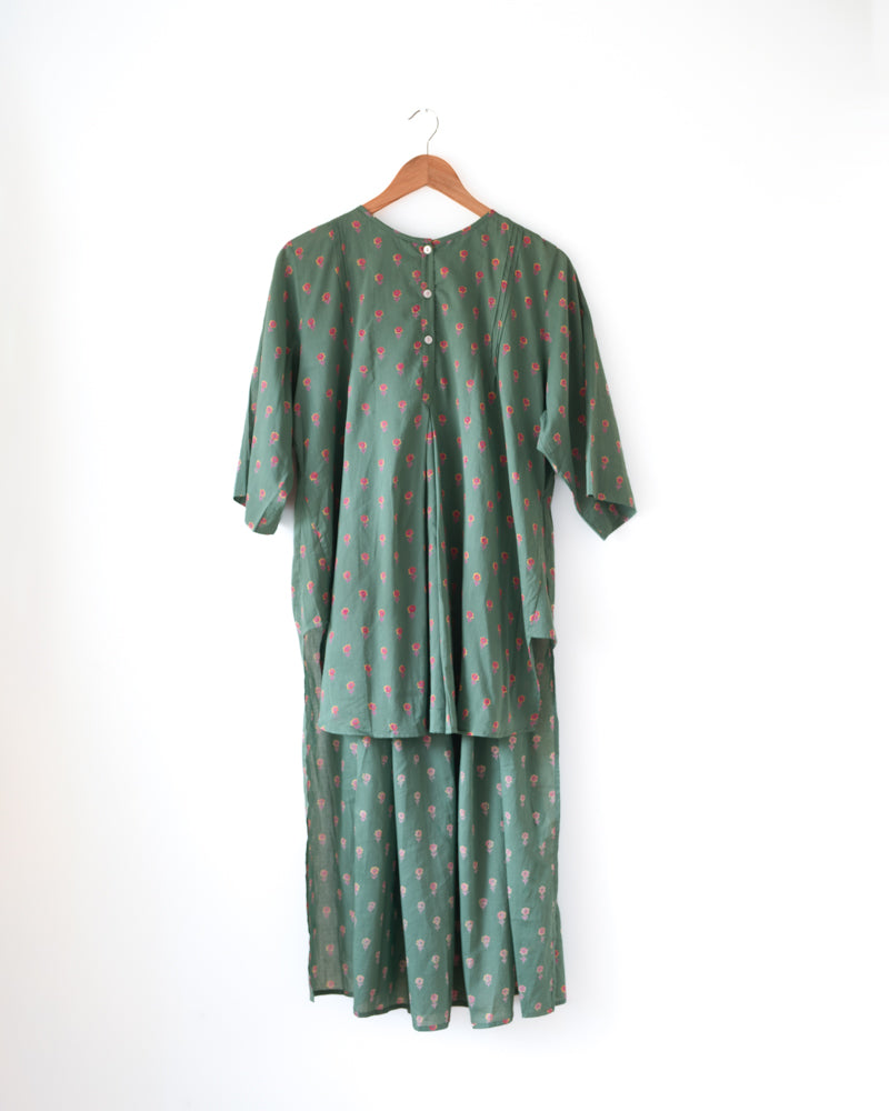 Dark green high low tunic kurta with pink Floral hand block print. Made in 100% cotton.
