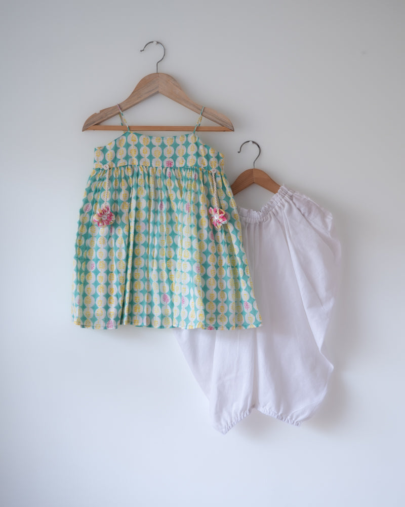 Hand block printed light green kurta with solid white Dhoti pants set.
