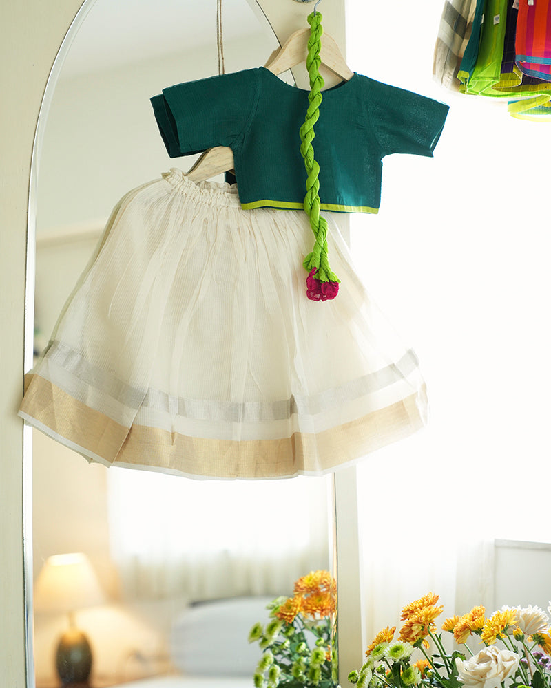 Kids green choli white lehenga set for Onam Diwali Weddings