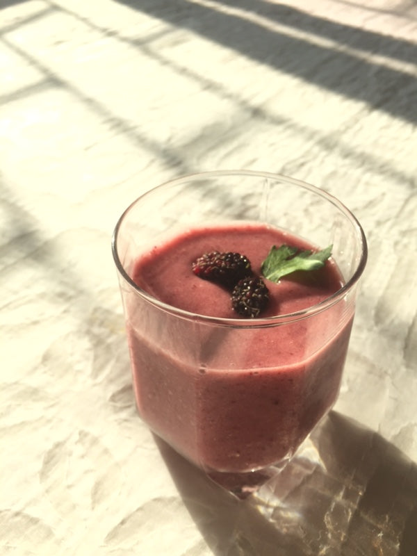 Frozen banana, strawberry, mulberry and celery smoothie