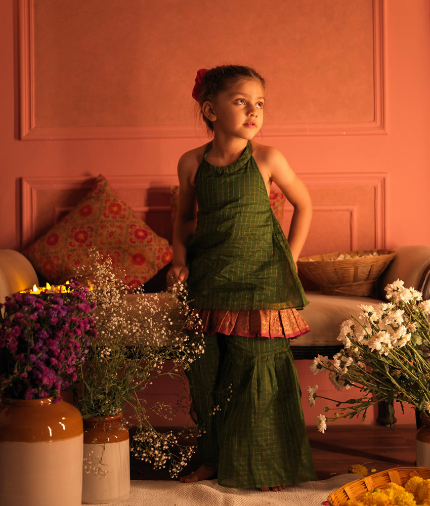 Green cotton silk halter neck kurti with sharara suit set handwoven with golden checks. Kids traditional ethnic outfits. Silkwear for kids.