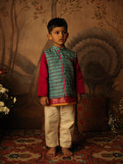 Teal Blue and grey striped Indian festive bandi nehru jacket made with Handwoven cotton silk. Perfect festive Kids silk ethnic wear. Paired with off white kora pants.