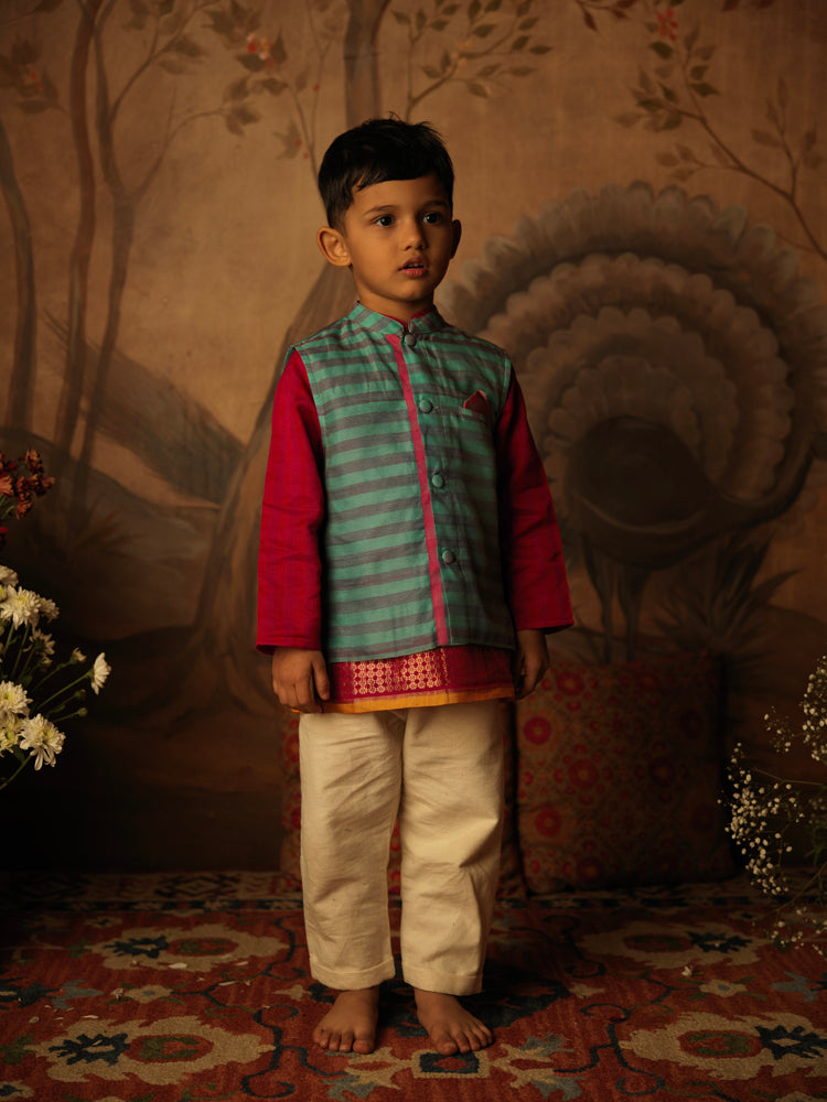Teal Blue and grey striped Indian festive bandi nehru jacket made with Handwoven cotton silk. Perfect festive Kids silk ethnic wear. Paired with off white kora pants.