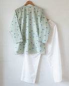 Unisex adults GOTS certified organic cotton pajama paired with blue checkered hand block printed kurta with pockets and natural shell buttons. Pajama has elastication at waist for ease of wear. Grandpa style kurta pajama set.
