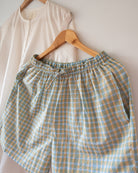 Unisex adults Gots certified organic cotton kurta and grey shorts co ord set. Kurta pockets and Shorts hand block printed by artisans in Jaipur, Rajasthan. Kurta has shell buttons and small pockets. Shorts have soft elastication and drawstring at waist for ease of wear.