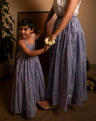 A deep purple geometric Rhombus print halter neck maxi dress. Has back tie ups.