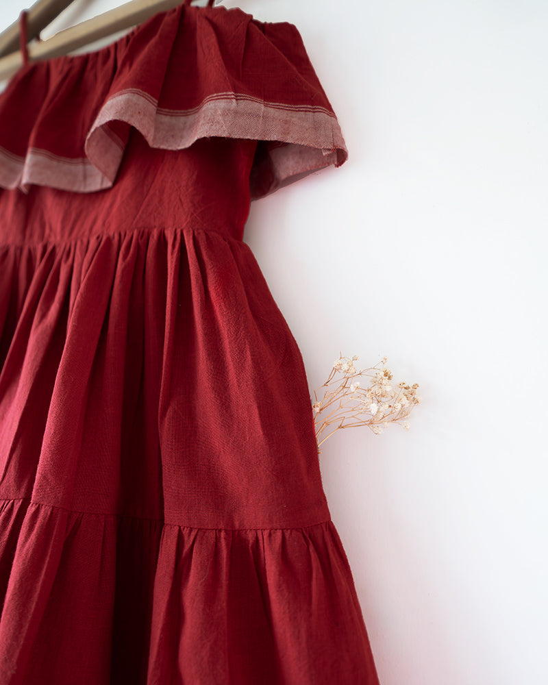 Handwoven cotton red tiered maxi dress with shoulder straps and pockets.