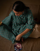 Dark green high low tunic kurta with pink Floral hand block print. Made in 100% cotton. 