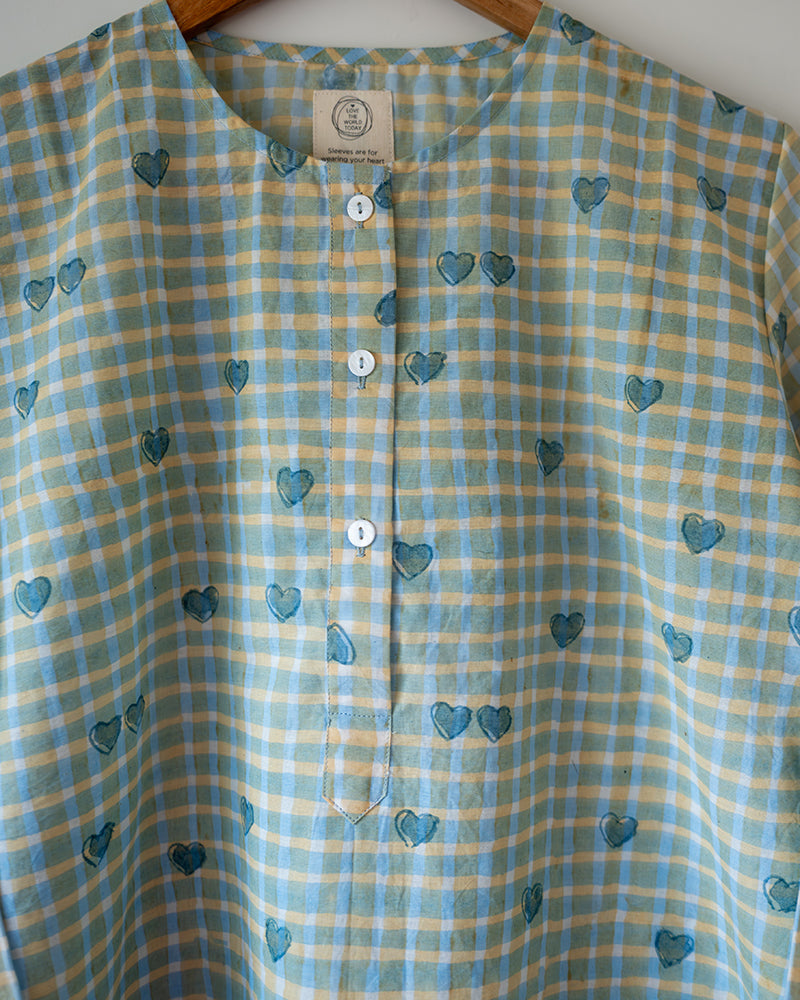 Unisex adults GOTS certified organic cotton pajama paired with blue checkered hand block printed kurta with pockets and natural shell buttons. Pajama has elastication at waist for ease of wear. Grandpa style kurta pajama set.