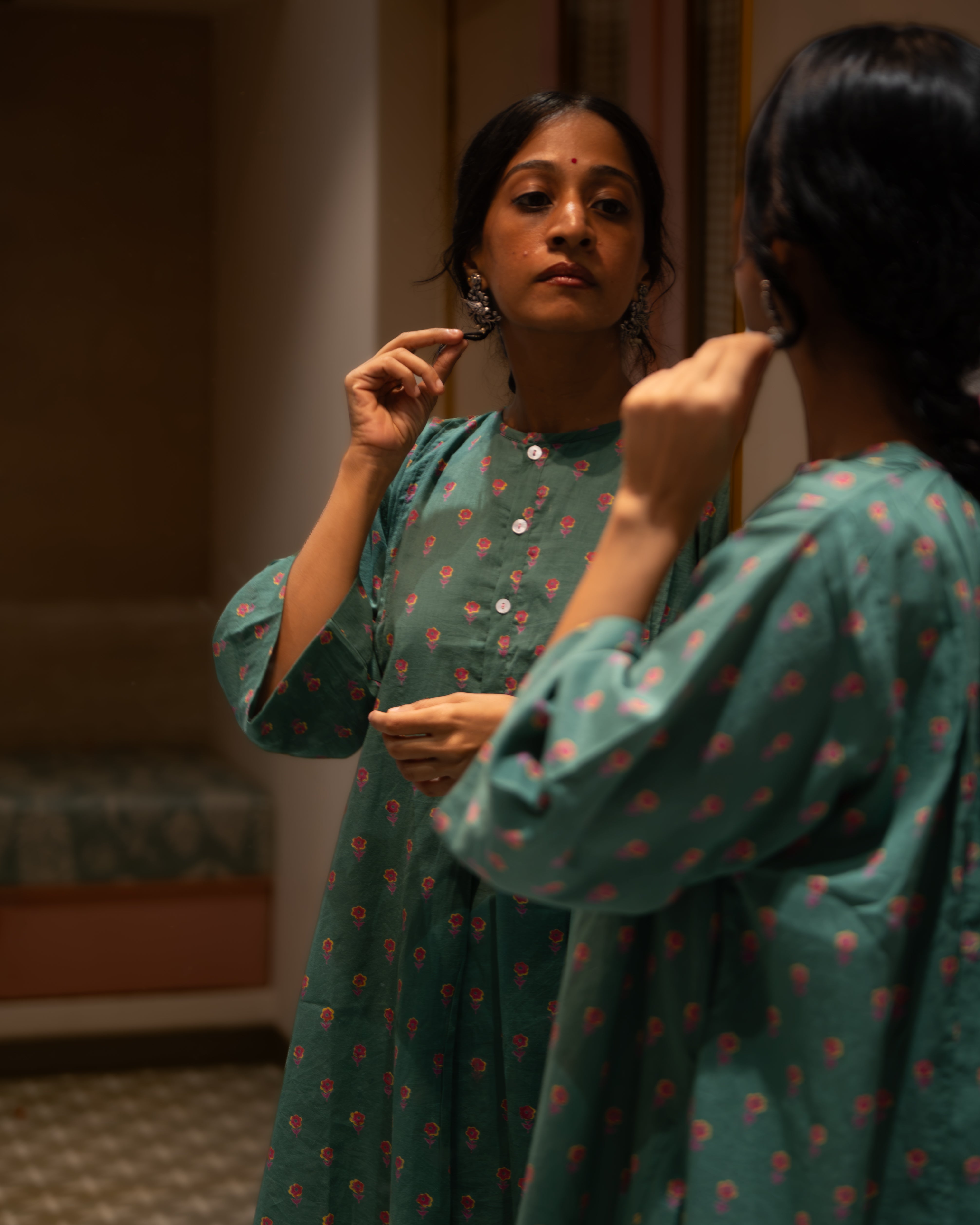 Dark green high low tunic kurta with pink Floral hand block print. Made in 100% cotton. 