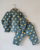 Unisex cotton striped shirt and pajama hand block printed with pockets and natural shell buttons. Pajama has elastication & drawstring at waist for ease of wear. Kimono style shirt & pajama set.