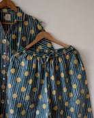 Unisex cotton striped shirt and pajama hand block printed with pockets and natural shell buttons. Pajama has elastication & drawstring at waist for ease of wear. Kimono style shirt & pajama set.