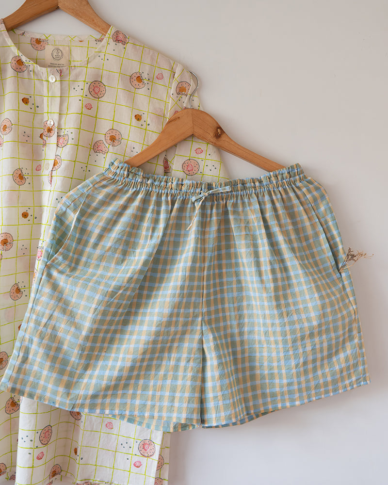 Unisex cotton kurta and shorts co ord set. Checkered kurta and Shorts hand block printed by artisans in Jaipur, Rajasthan. Kurta has shell buttons and small pockets. Shorts have soft elastication and drawstring at waist for ease of wear.