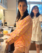 Unisex adults cotton kurta and grey shorts co ord set. Striped kurta and Shorts hand block printed by artisans in Jaipur, Rajasthan. Kurta has shell buttons and small pockets. Shorts have soft elastication and drawstring at waist for ease of wear.