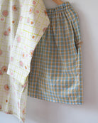 Unisex adults cotton kurta and shorts co ord set. Checkered kurta and Shorts hand block printed by artisans in Jaipur, Rajasthan. Kurta has shell buttons and small pockets. Shorts have soft elastication and drawstring at waist for ease of wear.