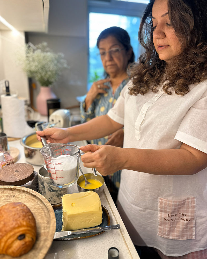 Unisex adults GOTS certified organic cotton white kurta and cotton peach shorts co ord set. 100% Cotton checkered Shorts hand block printed by artisans in Jaipur, Rajasthan. Kurta has pockets printed by hand block print. Shorts have soft elastication and drawstring at waist for ease of wear.