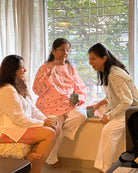 Mother & daughters lounging in comfortable cotton  loungewear.