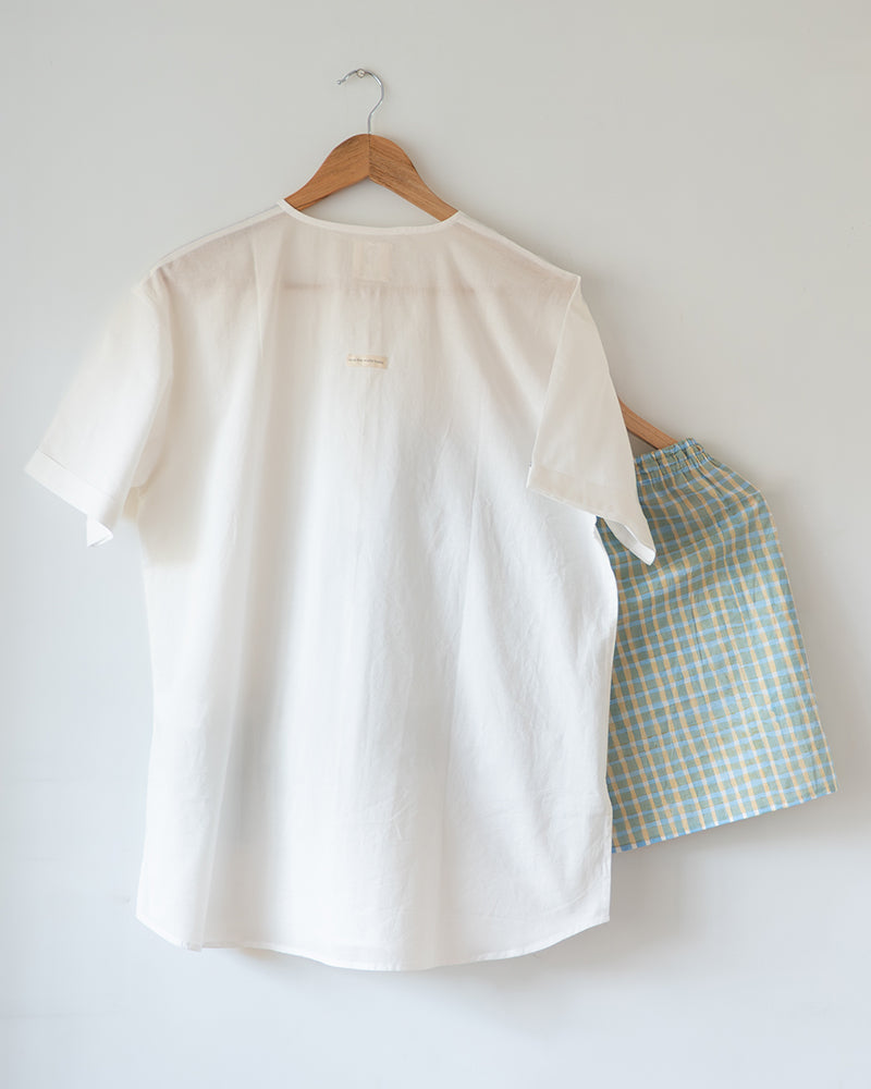 Unisex adults Gots certified organic cotton kurta and grey shorts co ord set. Kurta pockets and Shorts hand block printed by artisans in Jaipur, Rajasthan. Kurta has shell buttons and small pockets. Shorts have soft elastication and drawstring at waist for ease of wear.