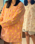 Unisex adults cotton kurta and grey shorts co ord set. Striped kurta and Shorts hand block printed by artisans in Jaipur, Rajasthan. Kurta has shell buttons and small pockets. Shorts have soft elastication and drawstring at waist for ease of wear.