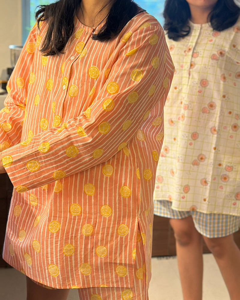 Unisex adults cotton kurta and grey shorts co ord set. Striped kurta and Shorts hand block printed by artisans in Jaipur, Rajasthan. Kurta has shell buttons and small pockets. Shorts have soft elastication and drawstring at waist for ease of wear.