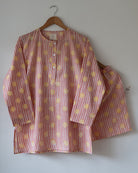 Unisex adults cotton kurta and grey shorts co ord set. Striped kurta and Shorts hand block printed by artisans in Jaipur, Rajasthan. Kurta has shell buttons and small pockets. Shorts have soft elastication and drawstring at waist for ease of wear.