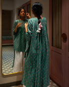 Dark green high low tunic kurta with pink Floral hand block print. Made in 100% cotton. 