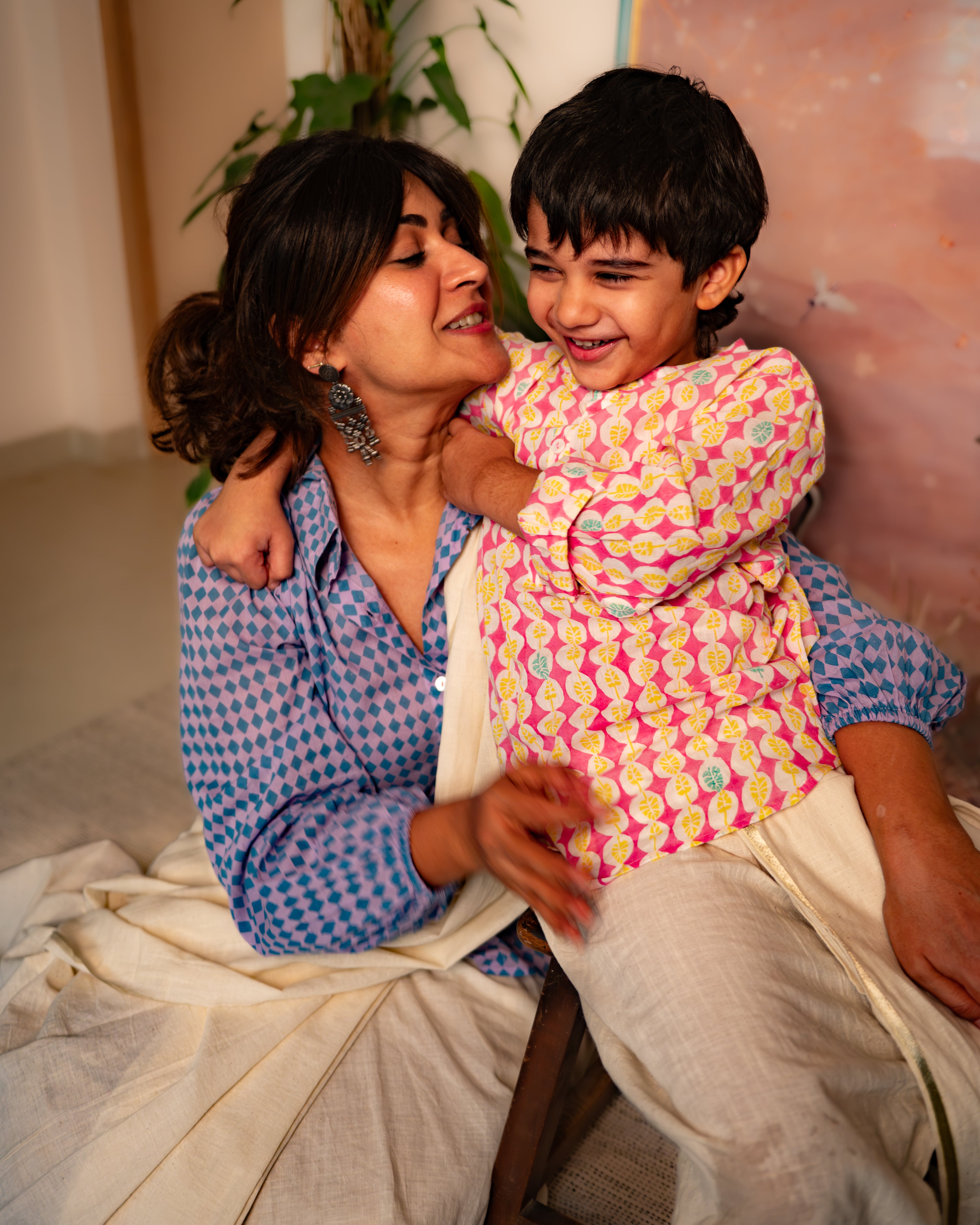 Geometric Rhombus hand block printed shirt for women with shell buttons and balloon sleeves.