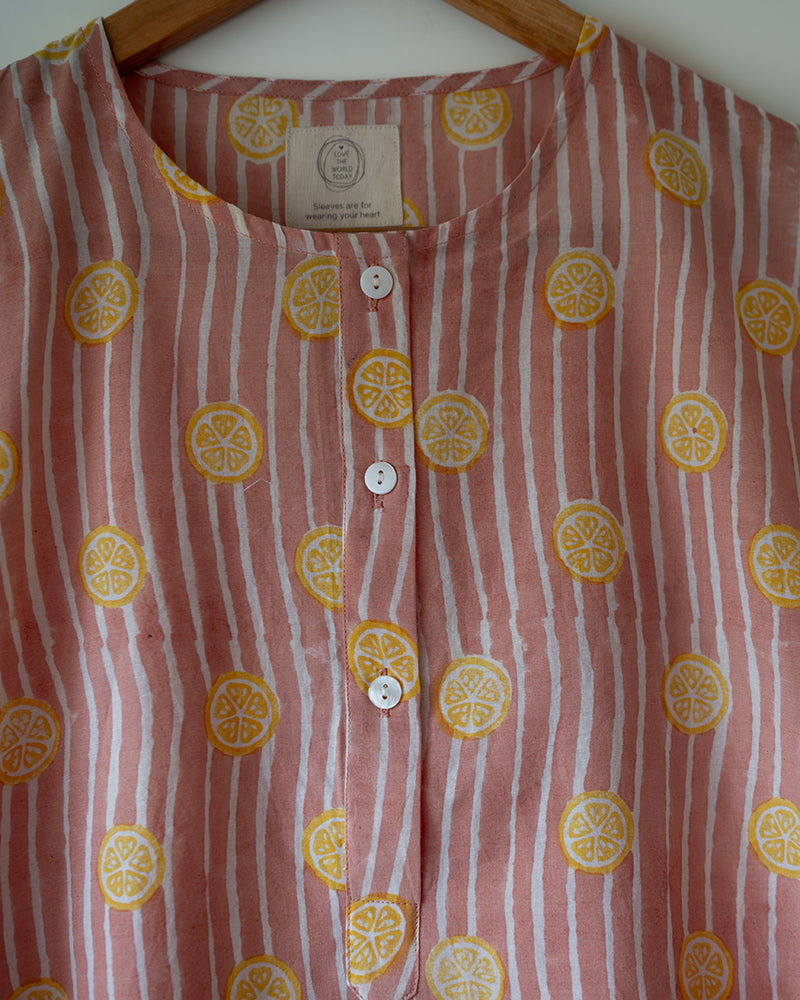 Unisex adults cotton kurta and grey shorts co ord set. Striped kurta and Shorts hand block printed by artisans in Jaipur, Rajasthan. Kurta has shell buttons and small pockets.