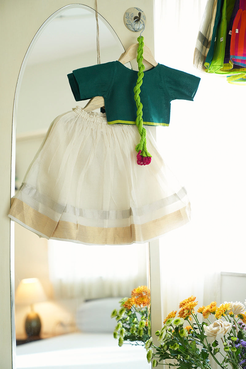 Kids green choli white lehenga set for Onam Diwali Weddings