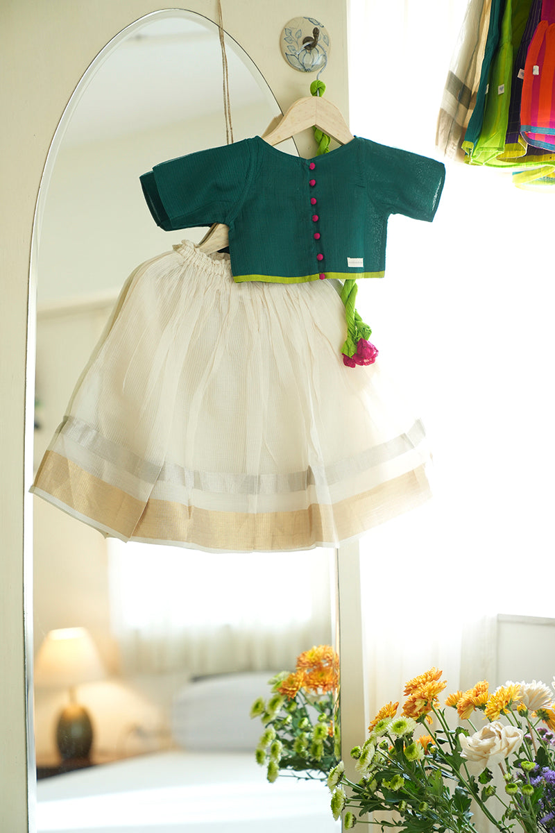 Kids green choli white lehenga set for Onam Diwali Weddings
