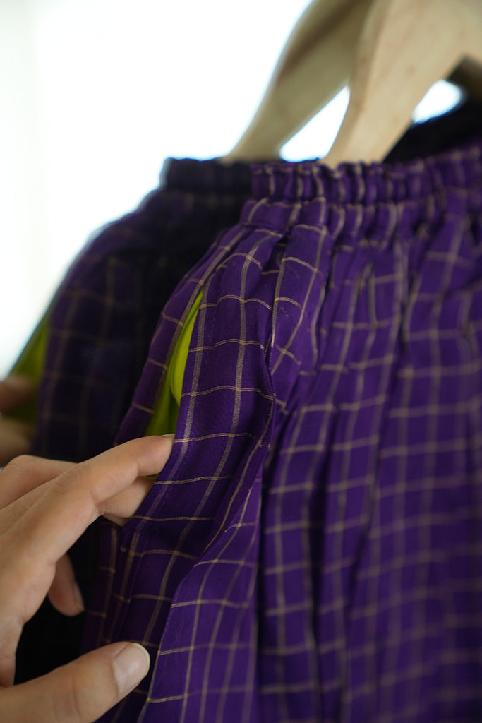girls ethnic lehenga skirt in purple with zari checks and a pocket