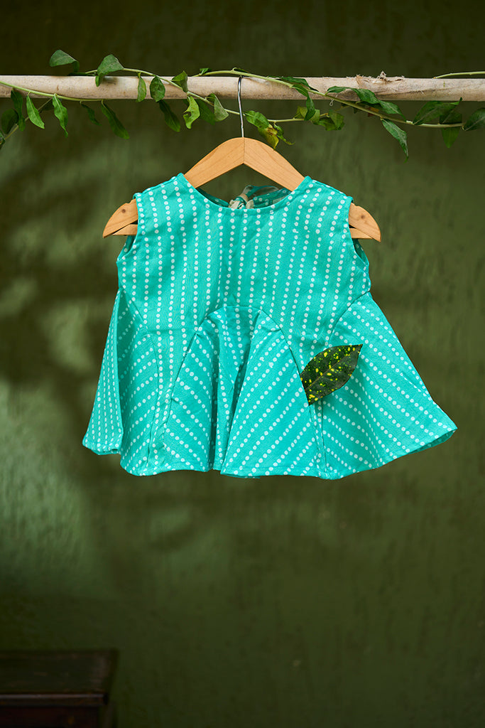 sleeveless-summer-flared-girls-top-in-blue-with-white-dot-with-pockets-in-100%-cotton-handblock-printed-in-Jaipur