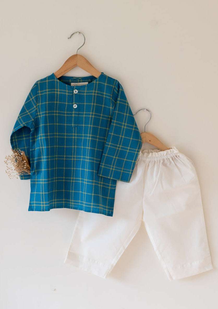 Kids unisex Kurta Pajama set wiith Navy Blue Checks Kurta and White Pajamas perfect for summers. Kurta made with soft breathable handwoven cotton and pajamas made in GOTS certified organic cotton. 