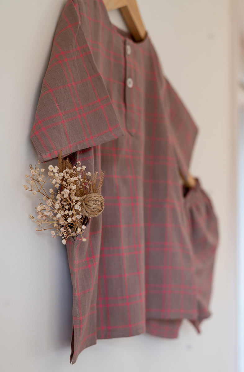 Summer night suit for boys and girls in handwoven cotton in warm sand and pink checks. Perfect co-ord set for summer. Half sleeve kurta in soft handwoven cotton with elasticated shorts. Kurtas and Pajamas,  both have pockets.