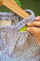 soft-elastication-and-lime-green-pocket-details-on-unisex-kids-pants-in-grey-hand-block-print-cotton- fabric-from-jaipur-artisan-made