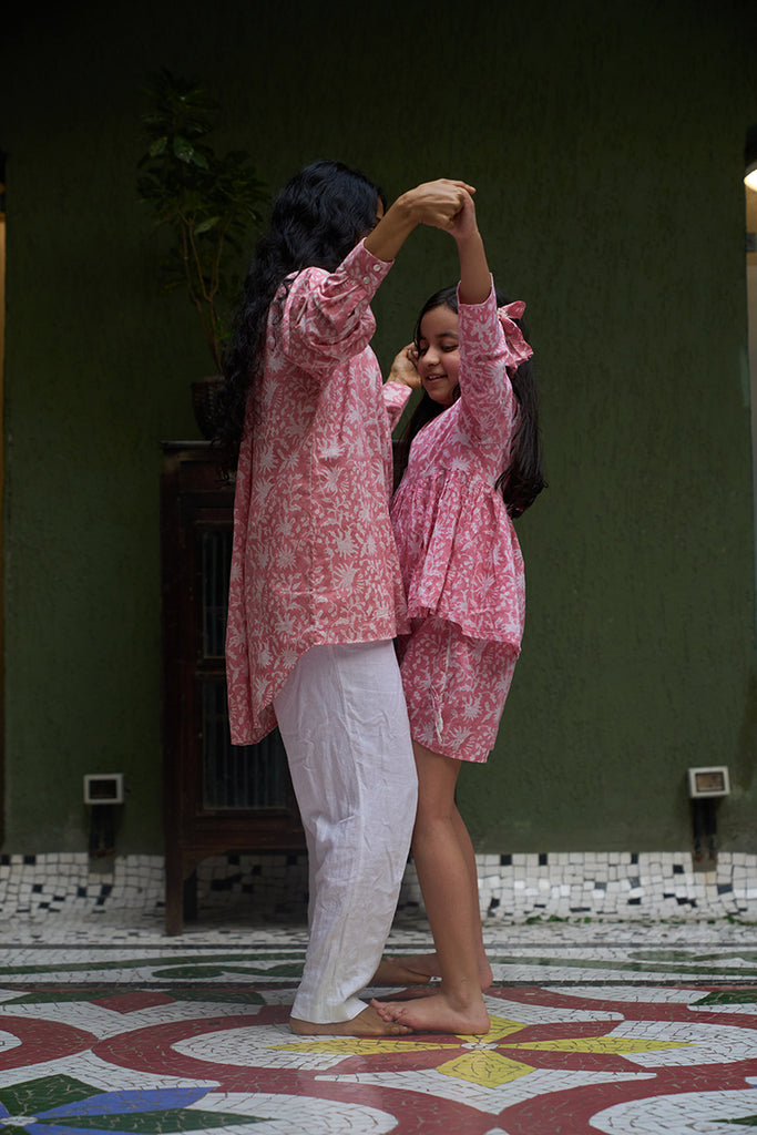 mother-and-daughter-dancing-in-twinning-sets-in-pink-floral-handblock-printed-in-Jaipur-in-pure-breathable-cotton